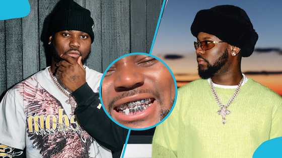 King Promise rocks new silver grillz on his teeth, flaunts them in video