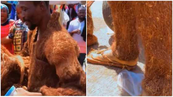 Ghanaian man showcases the clothes, slippers and bag he made from wood