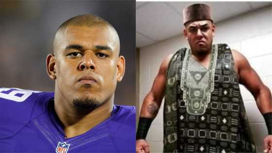 Meet top Nigerian WWE star who rocks Yoruba agbada to the rings, stands at 6ft and 10 inches tall (Photos)