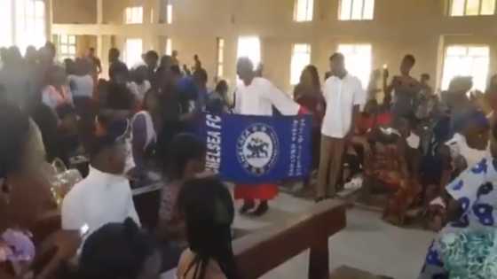 Chelsea fans storm church with flag to celebrate Champions League victory in video