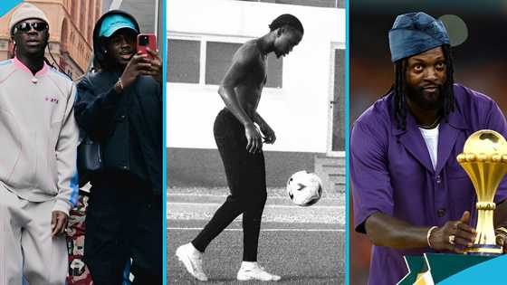 Stonebwoy sets up younger brother, makes him play football with Adebayor and Asamoah Gyan
