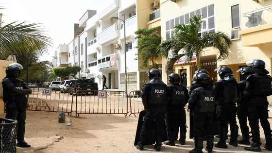 Senegal police surround opposition chief's home over protest call