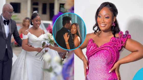 Ghanaian bride rocking a classy white gown receives 12 white roses from the 12 special women in her life