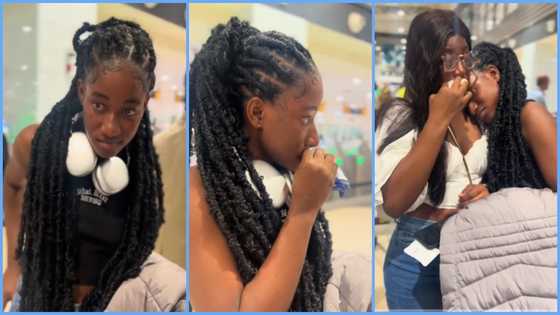 Ghanaian lady sheds tears at airport as she readies to travel abroad, bids touching farewell to relative