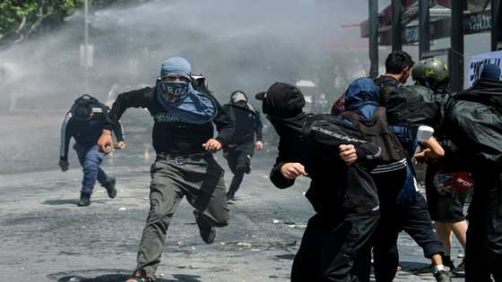 200 arrested, dozens injured in Chile protests