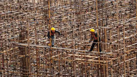 China central bank cuts benchmark lending rate to boost economy