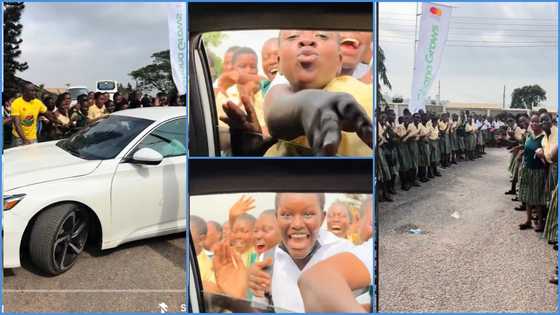 Aburi Girls students mob Demzy Baye & other DWP members as they visit school