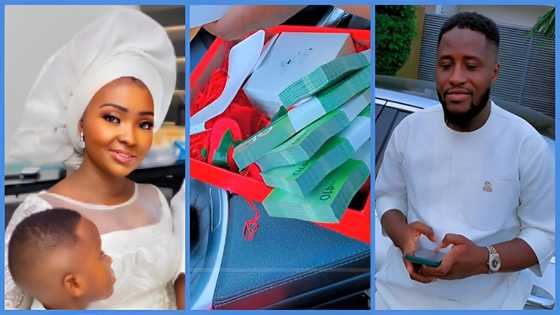 Ghanaian woman prays for husband after he gifted her bundles of cash and iPhone on her birthday