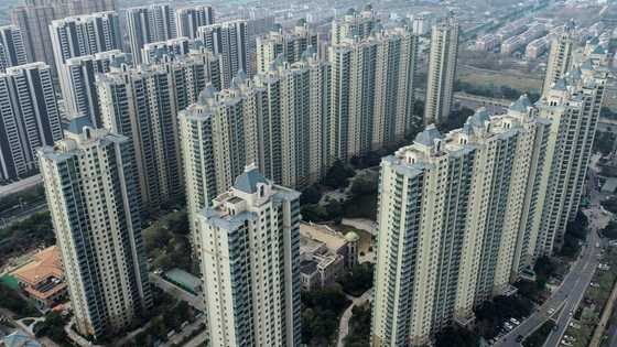 Troubled China Evergrande pledges to repay debts in 2023