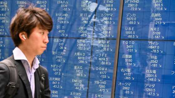 Asian markets mixed as investors eye trade talks