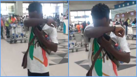 Ghanaian man cries at Kotoka airport as he readies to travel abroad, friend consoles him, video causes stir