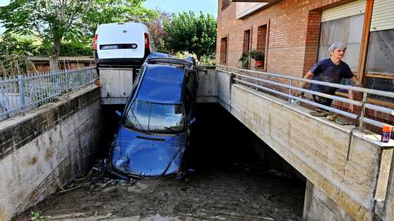 'Like a waterfall': Italy storms kill 10, spark climate debate