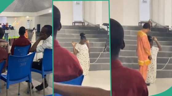 Video as university student gets punished in church by VC, made to kneel and raise her hands up
