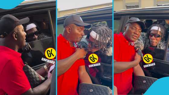 Appiah Stadium prays and kisses Shatta Wale's cheek as they meet for the first time in public, video