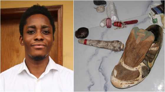 24-year-old sakawa boy smiles after being arrested with 'charms' in his possession (photos)