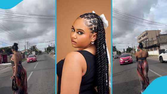 Moliy causes traffic as she shakes it to the max in the middle of the road