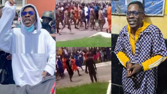 First video of Shatta Wale in Ankaful Prison pops up; inmates line up to give him fans