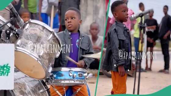 5-year-old boy drums excellently on the street of Lagos, people gather around him