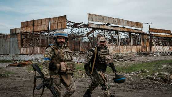 Civilians lie slain as Russian troops flee Ukraine push