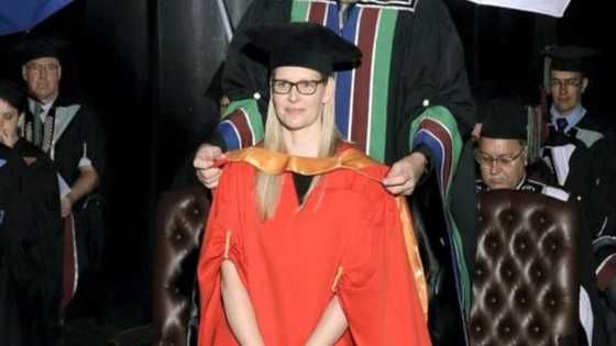 Proud Doctor celebrates the day she got a PhD after 15 years of hard work