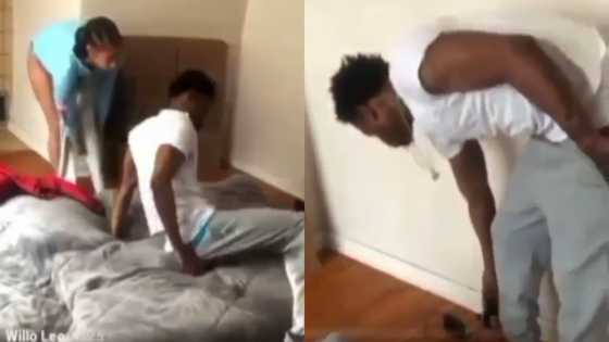 Hard guy: Lady catches boyfriend in bed with another woman in her apartment in video