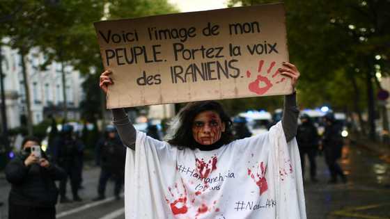 Police clash with Iran protesters in London and Paris