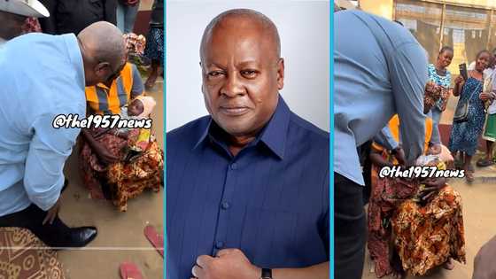 President John Mahama gifts a newborn baby money during Volta Region trip
