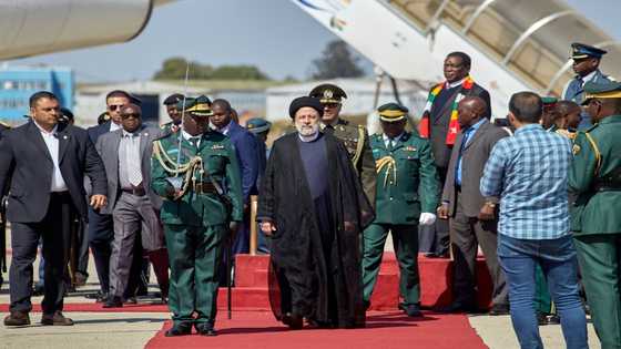 Iran's Raisi visits fellow outlier Zimbabwe ahead of key vote