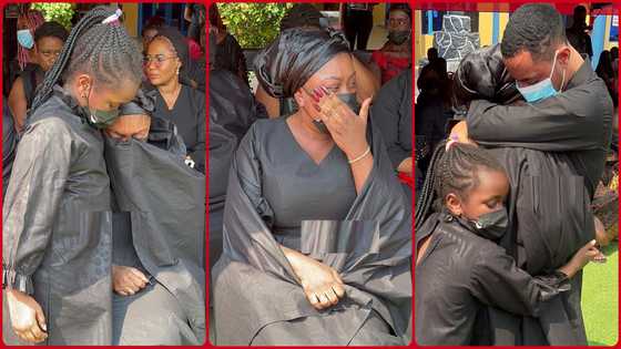 Sad scenes: Afia Schwar's children console her as she weeps at her father's one-week obsvervance, video drops
