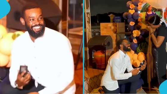 Friends cheer as Ghanaian man proposes to girlfriend in surprise engagement setup, video trends