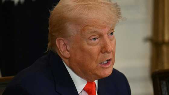 Trump fires new tariff threats at Apple and EU