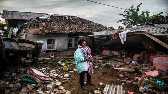 Hunt for buried survivors after Indonesia quake kills 162