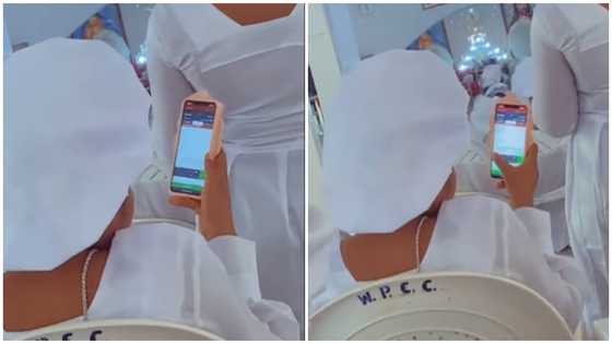 Video of a woman checking her bet slip in church during Bible reading sparks reactions: "For the love of the game"