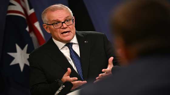 Australia launches formal inquiry into ex-PM's secret power grab