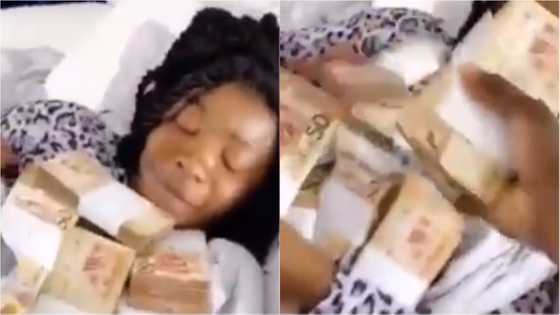 Video of boyfriend showering money on pretty sleeping girlfriend