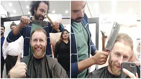 Barber shows skills, uses butcher's knife, broken glass and hammer to cut hair in style