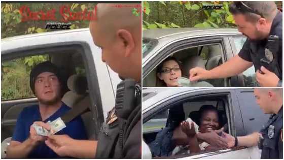 Police officers in US randomly stop people on the road, give them GHC600 for X'mas in video
