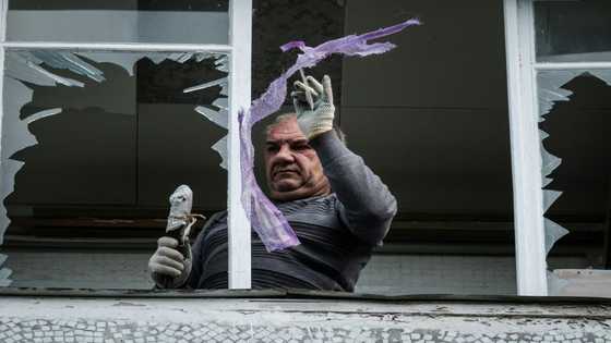 Missiles hit apartments in Ukraine city, as Putin mobilises