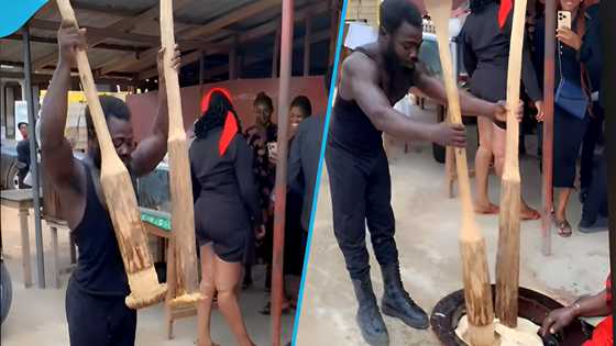 Netizens react to video of strong Ghanaian man pounding Fufu with two heavy pestles concurrently