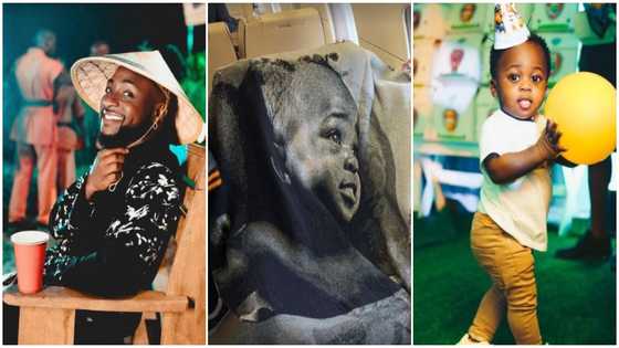 Davido flaunts wealth in new photo as he gets customised blanket with his son Ifeanyi's face printed on it