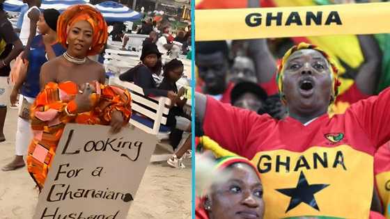 Nigerian lady goes to town with a huge placard looking for a Ghanaian man to marry