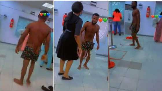 Annoyed young man takes clothes off inside a bank as he demands his money back in video