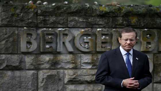 Israeli president retraces father's footsteps at Nazi camp