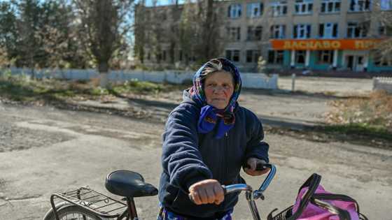 War and peace collide in Ukraine's recaptured ruins