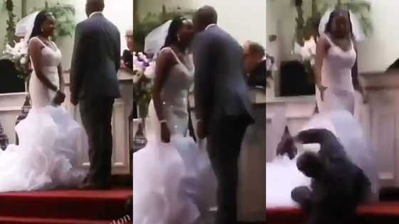 Groom leaves guests in fear as he falls flat under the anointing after kissing bride at their wedding in video