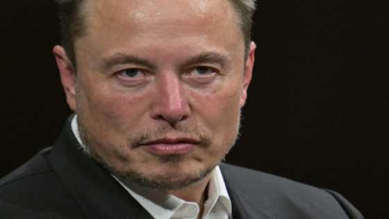 Elon Musk puts his "X" on Twitter