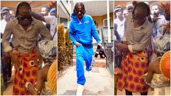 Stonebwoy dances "agbadza" with beautiful girl in adorable video, fans admire: "True legend"