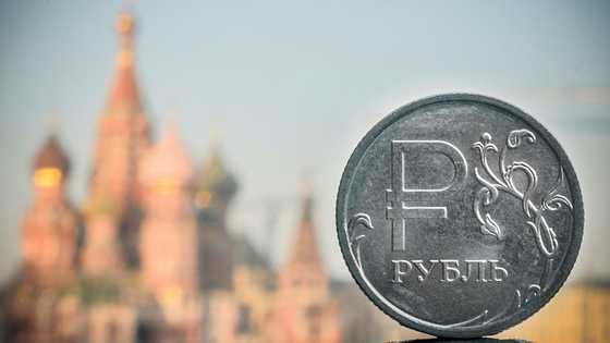 Russian ruble plunges past 100 against dollar for first time since March 2022