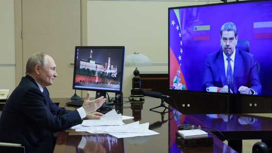 Putin, Maduro vow to boost ties in wake of Trump sanctions