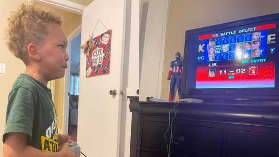 Dad plays PlayStation game against son beats him 11-2 to teach him humility